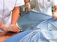 Sweet asian nurses giving handjob in group for cum sample