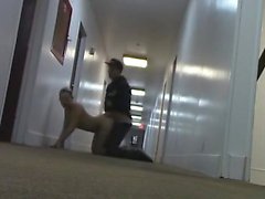 Crazy couple fucks in the hallway of a hotel