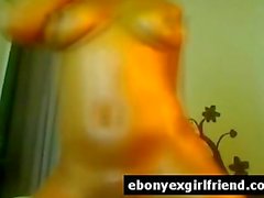 Foxy ebony ex girlfriend rubs her wet juicy pussy in solo action