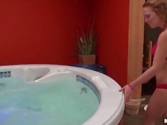 Bikini chick gets in hot tub and sucks cock