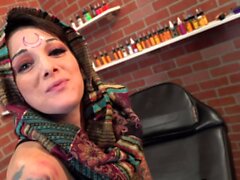 Sully Savage gets a new UV tattoo on her forehead