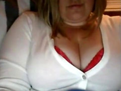 Chubby blonde plays with chubby tits on Chatroulette