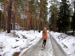 Nude Girl walking in an abandoned campsite