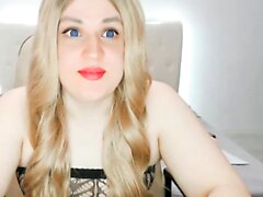Solo blonde chick using cucumber to masturbate