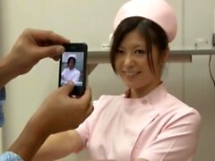 Bigtit Japan masseuse in uniform gives a handjob