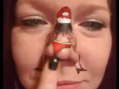 Dancing Santa on girl's nose