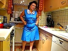 mature sexy bbw from desirebbws trying on aprons