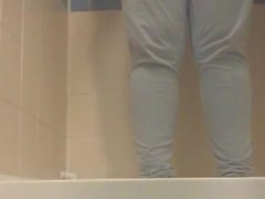 S pissing herself in the shower