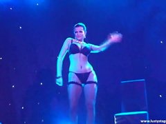 Busty MILF shows her amazing body on the stage