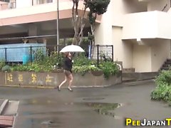 Kinky asian pees street