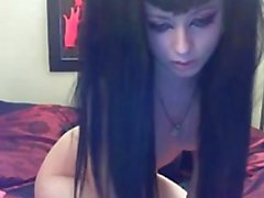 goth girl masturbating with a huge glass dildo