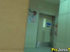 Asians piss in bathroom