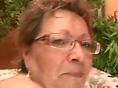 Chubby Granny in Glasses Takes on Two Crazy Cocks