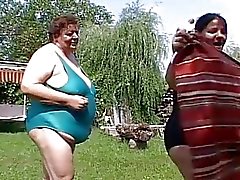 Horny fat lesbians pleasuring pussy in the beach