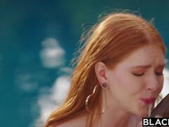 BLACKED Gorgeous redhead Jane has passionate poolside sex