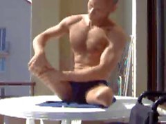 DAK amputee guy tanning in a speedo 2