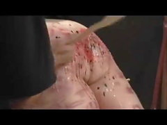 gorgeous master pours hot wax all over her big spanked ass