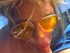 Excellent car blowjob from blonde milf in sunglasses