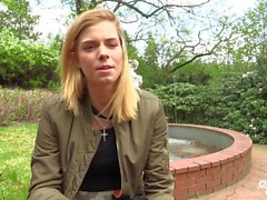 Blonde babe masturbates after being interviewed outside and loves it