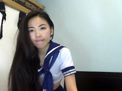 Japanese teen in uniform sucks jerks POV cock