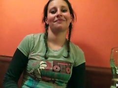 Pigtails teen shows her tits in the bar